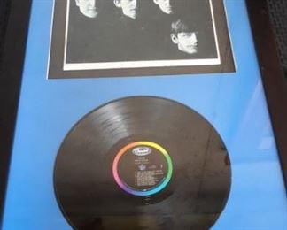 Framed Beatles album and cover.