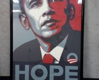 Framed Obama campaign poster.