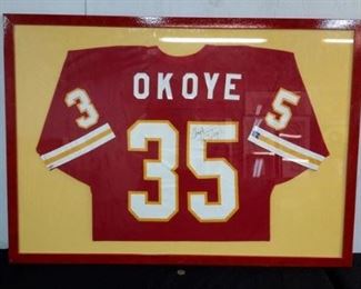 Framed and signed "Okoye" jersey.