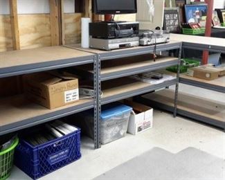 Metal and wood shelving, varying sizes.