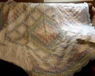 King sized handmade quilt and 2 pillow cases.