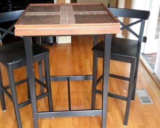 Tiled pub table and 2 chairs.