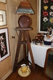 signed southwestern-style lamp on Potters stand