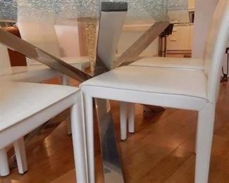 Chrome base to this fabulous dining room table. Excellent condition and a great modern look!