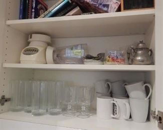 Kitchen cabinets full of essentials.