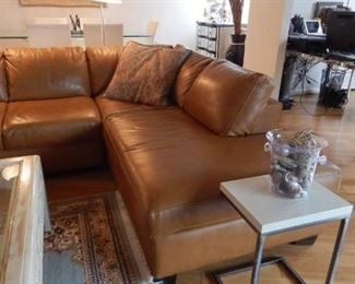 Leather city size sectional. Nice piece! Accent table with marble top.