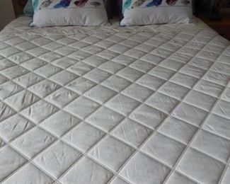 Bed and bedding for sale.