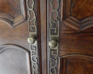 Detail and handsome metal handles.