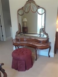 Matching vanity with stunning mirror; tufted stool