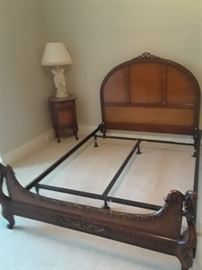 Standard bed which has been outfitted with queen-side rails to accommodate larger mattress. Matches other bedroom pieces. Wood side rails also available if original size is more suitable.