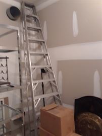 Tall metal ladder.