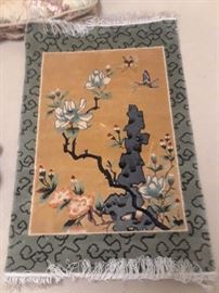 Small fringed silk rug