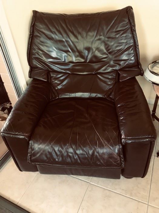 CHAIR.  DARK BROWN LEATHER.  BROUGHT OVER FROM AUSTRIA.