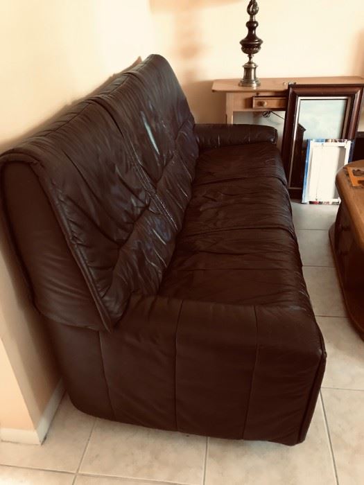 SUPER COOL DARK BROWN LEATHER COUCH WITH LOVESEAT AND SIDE CHAIR AS LISTED.  100% LEATHER AND IN SUPERB CONDITION.  BROUGHT OVER FROM AUSTRIA.