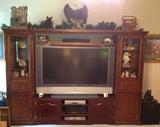 Entertainment Center. TV not included. Gorgeous tastefully detailed figurines including Eagle, Bear, Meese, Deer, Owls, Buffalo, Wolfe and more.