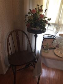 Antique chair and plant stand.