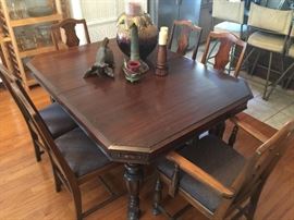 Antique dining table with six chairs. Nice!
