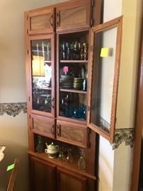 corner cabinet, dinnerware