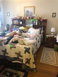 bed, end tables, bed linens