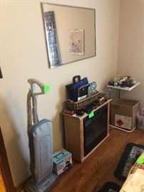 upright vacuum, mirror, electric log heater