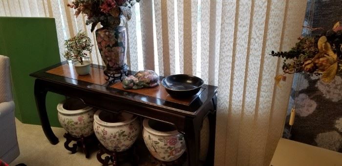 Oriental table, fish bowls, accessories.