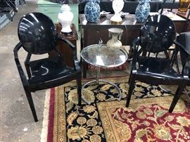 Eileen Gray by Aram designs from ClassiCon and a pair of Kartell by Philip Stark Ghost Chairs