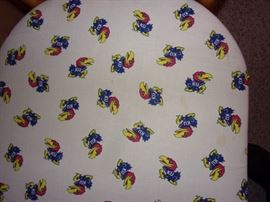 Vintage bar table and two chairs with KU upholstery. There are two sets.