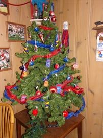 KU Christmas ornaments (sold separately from tree).