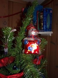 KU Christmas ornaments (sold separately from tree).