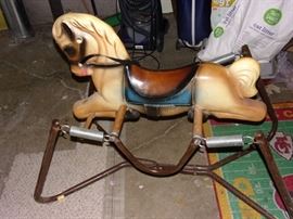 Vintage spring bounce riding horse.