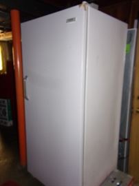 Frigidaire Tappan upright freezer.