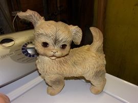 Antique plastic puppy with eyes that open/close.