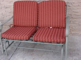 Metal love seat swing with cushions, in great condition.