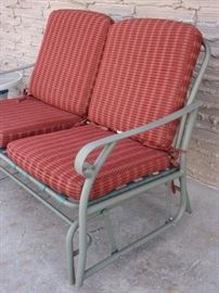 Metal love seat swing with cushions, in great condition.