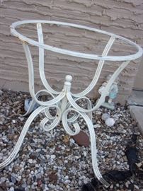 Heavy wrought iron table base.