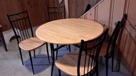 Pretty chop block table and 4 metal chairs with chop block seats.
