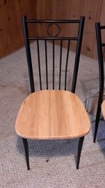 Pretty chop block table and 4 metal chairs with chop block seats.