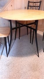 Pretty chop block table and 4 metal chairs with chop block seats.