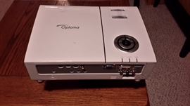 Optoma table or ceiling mount projector. Comes with ceiling mount. (2 projectors available)