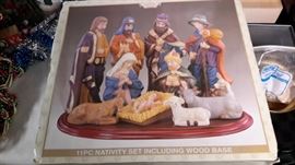11pc Nativity set including wood base, in box.