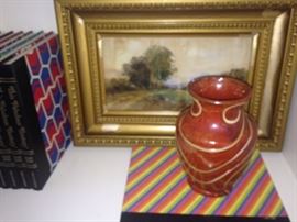 Colorful vase and more books