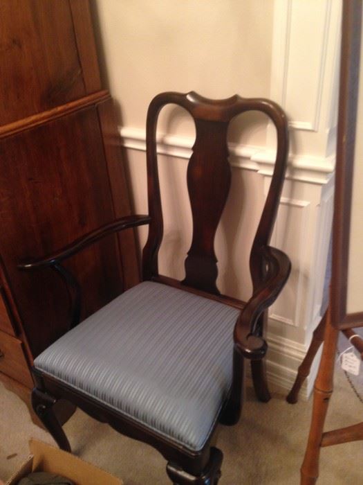 One of the two host chairs for the dining room set