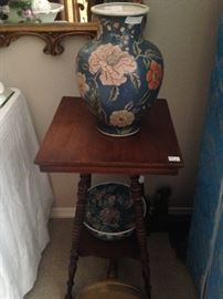 Antique side table and vase