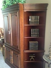 3-section entertainment armoire; beautifully bound green and gold books