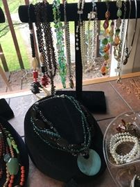 Costume jewelry: necklaces, bracelets, pins, and rings