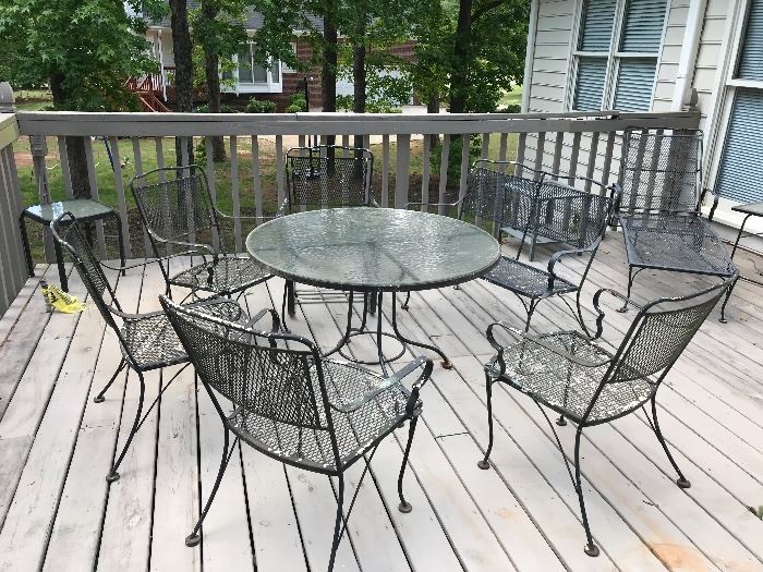Patio chairs and table without cushions