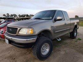 #54: 2002 Ford F-150 Pickup Truck
Estimated DMV Registration: $339 and $70 doc fees 

Year: 2002
Make: Ford
Model: F-150
Vehicle Type: Pickup Truck
Mileage: 
Plate:
Body Type: 4 Door Cab; Super Cab; Styleside
Trim Level: XL; XLT; Lariat; King Ranch
Drive Line: RWD
Engine Type: V6, 4.2L (256 CID); OHV
Fuel Type: Gasoline
Horsepower:
Transmission:
VIN #: 1FTRX17212NA02863
