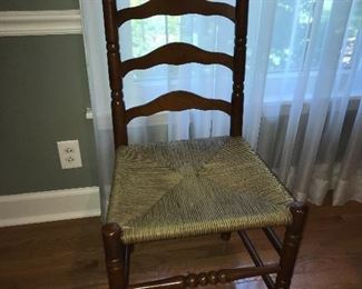 Single vintage ladder back chair.