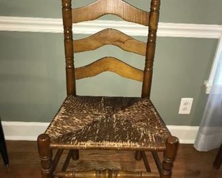Single vintage ladder back chair.