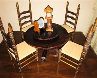 Cute toy-size handmade table and chairs.